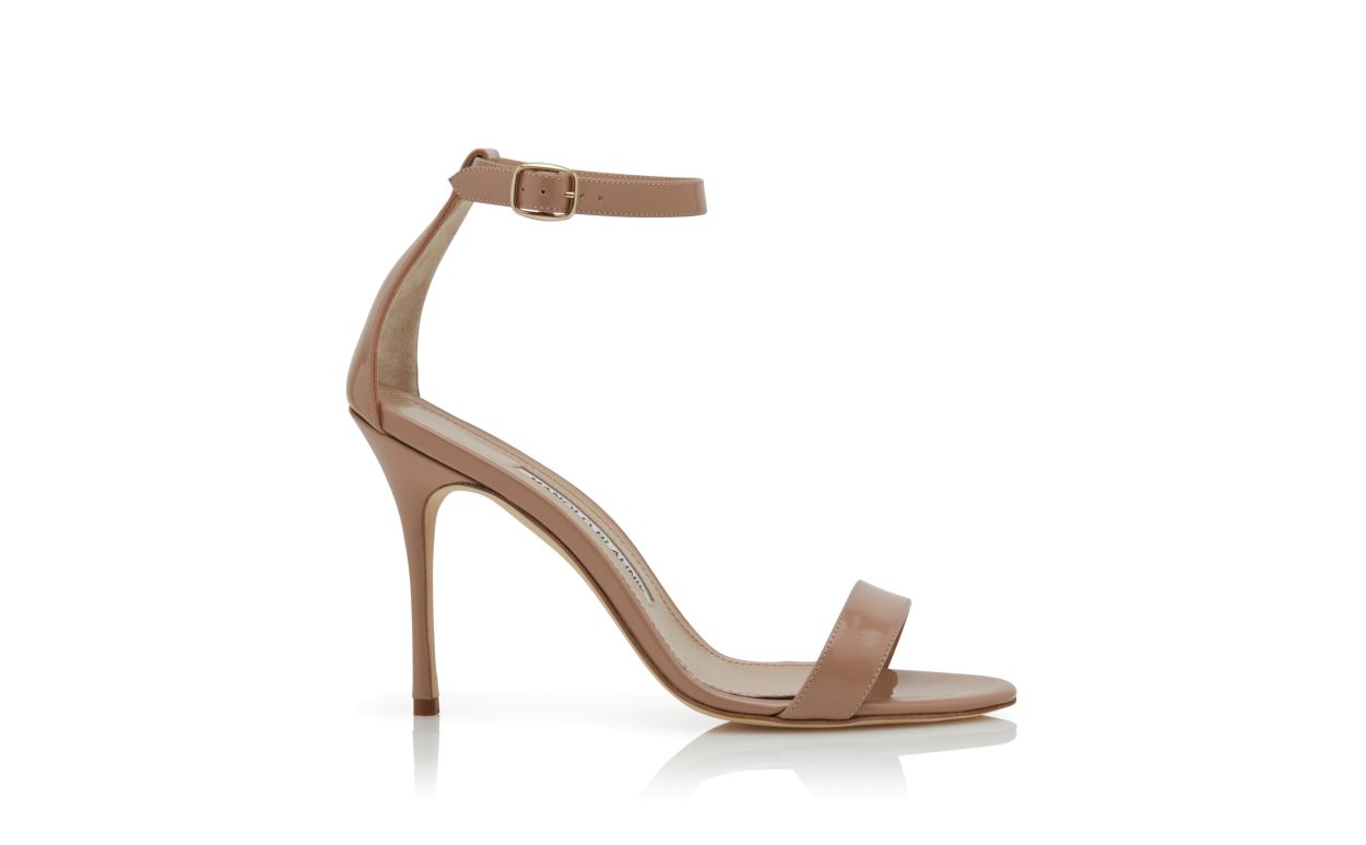 Sandali con cinturino alla caviglia in pelle lucida beige