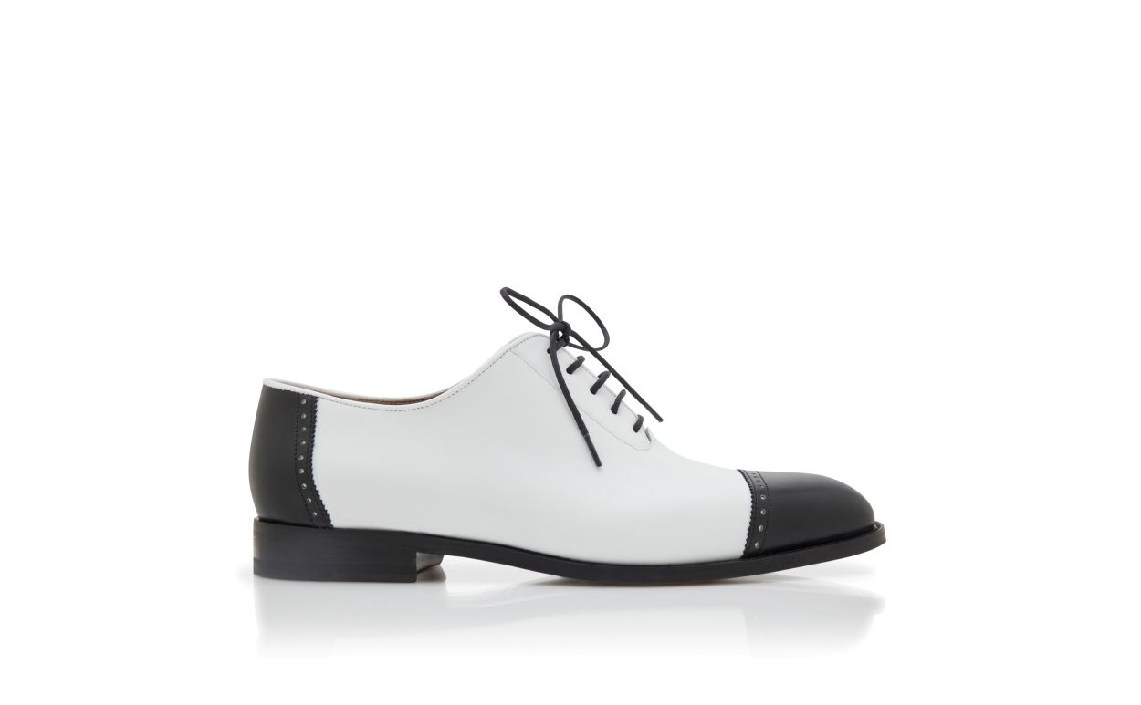 Scarpe in pelle di vitello nera e bianca con lacci