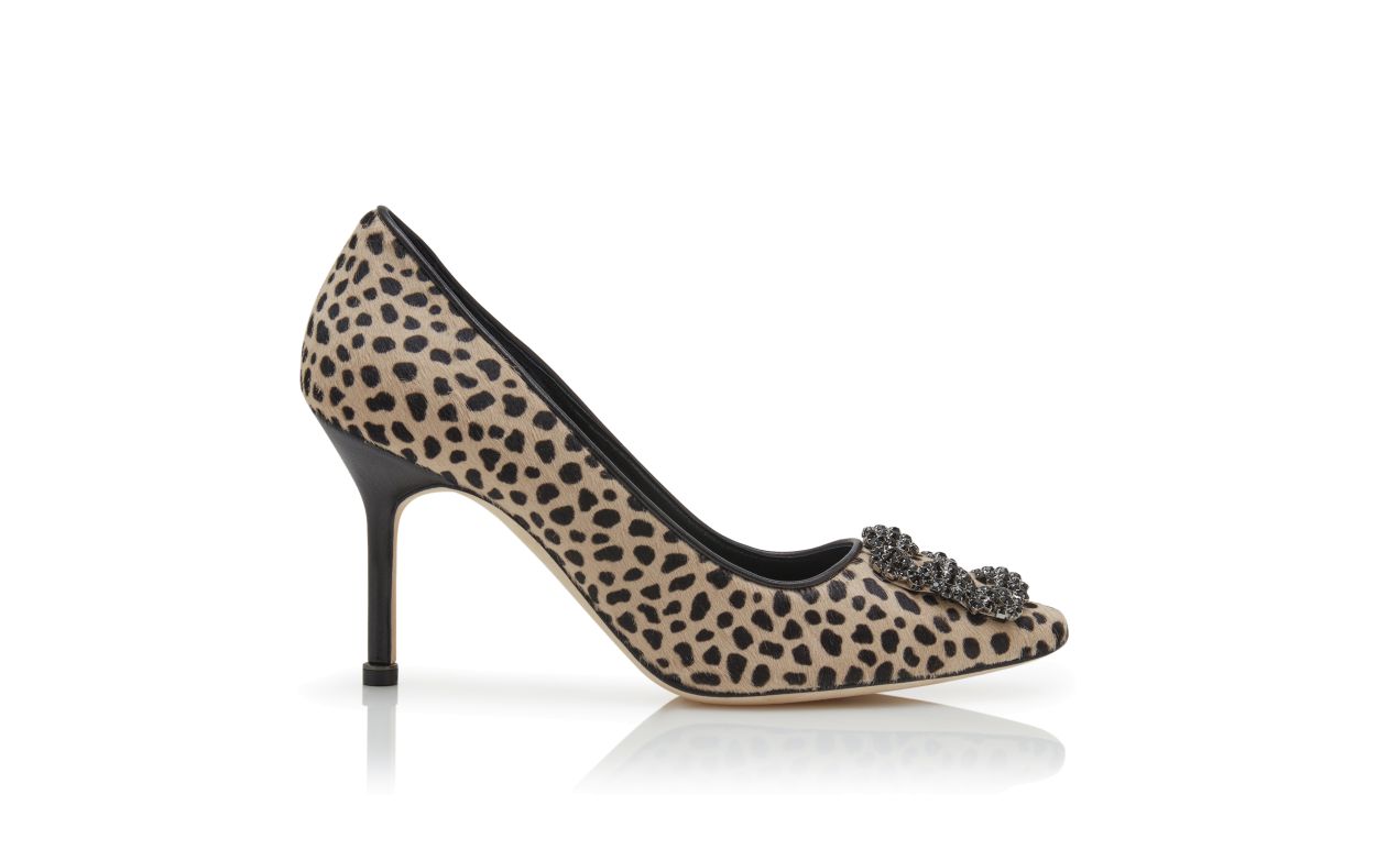Pumps con tacco a spillo in pelle di vitello con stampa animale e fibbia decorativa